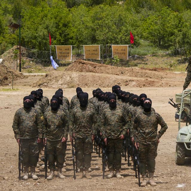 Des combattants du Hezbollah en exercice dans le sud du Liban en mai 2023 (image d'illustration). [Keystone - Hassan Ammar]