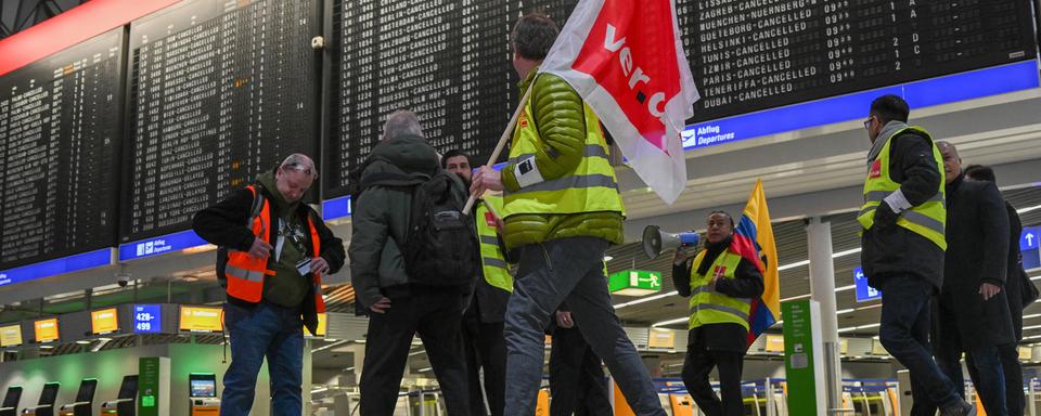 Une grève affecte notamment l'aéroport de Francfort. [Keystone - DPA/Arne Dedert]