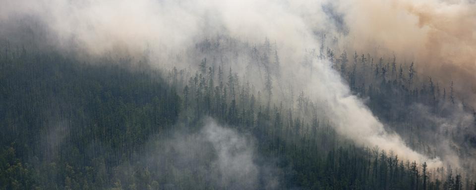 Photo prise par avion de feux phénoménaux dans la région de Sakha en Sibérie (27 juillet 2021). [AFP - Dimitar Dilkoff]