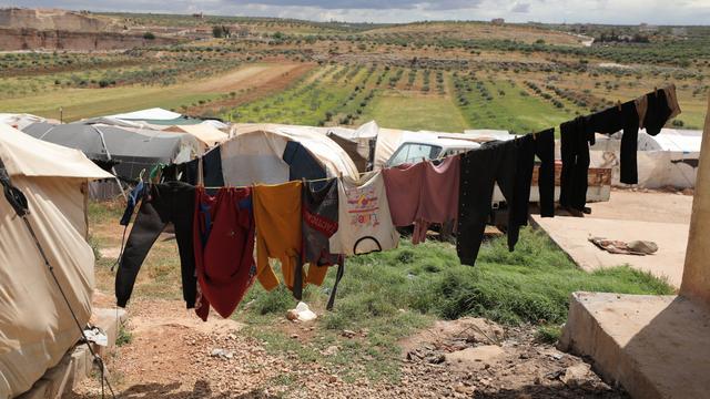 Des tentes du camp d'Al-Tehh, en bordure d'un terrain agricole de la région d'Idlib, le 7 mai 2022. [EPA/Keystone - Yahya Nemah]