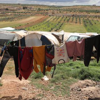 Des tentes du camp d'Al-Tehh, en bordure d'un terrain agricole de la région d'Idlib, le 7 mai 2022. [EPA/Keystone - Yahya Nemah]