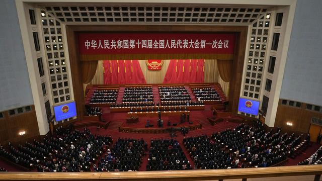 Le Parlement chinois, inféodé au Parti communiste (PCC), ouvre dimanche pour neuf jours sa session annuelle. [Keystone - AP Photo/Ng Han Guan]