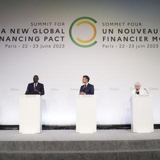Le sommet à Paris pour un pacte financier mondial se termine sans grande révolution. [Keystone - AP Photo/Lewis Joly]