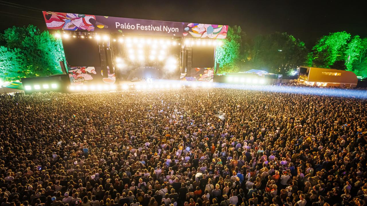 Le public de la grande scène du Paléo Festival en attente du concert de Orelsan, le 23 juillet 2022. [KEYSTONE - Valentin Flauraud]