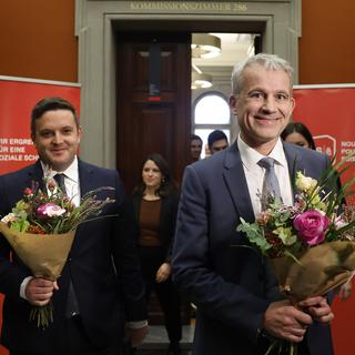 Le Parti socialiste a choisi comme candidats le parlementaire grison Jon Pult et le président du conseil d'État de Bâle-Ville Beat Jans. [Keystone - Peter Klaunzer]