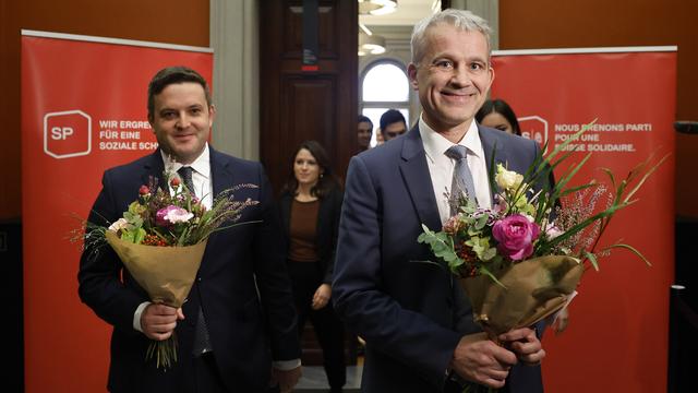 Le Parti socialiste a choisi comme candidats le parlementaire grison Jon Pult et le président du conseil d'État de Bâle-Ville Beat Jans. [Keystone - Peter Klaunzer]