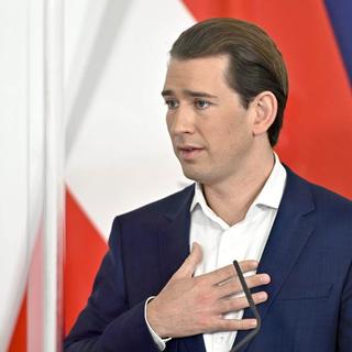 L'ex-chancelier autrichien Sebastian Kurz lors d'une conférence de presse suivant sa nomination. [APA/Keystone]