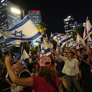 Manifestations en Israël en réaction à la réforme judiciaire voulue par le gouvernement de Benjamin Netanyahou. [AP/Keystone - Ohad Zwigenberg]