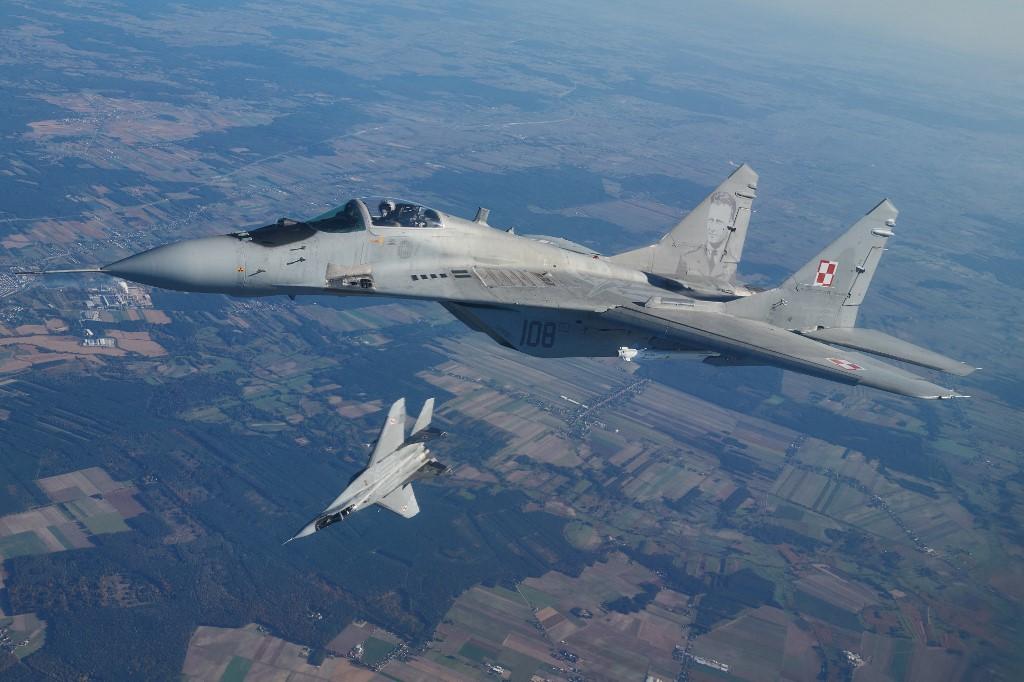 Deux avions de combat MiG-29 lors d'un exercice de l'Otan en Pologne, le 12 octobre 2022. Image d'illustration. [AFP - RADOSLAW JOZWIAK]