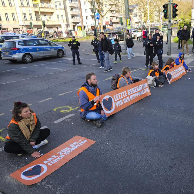 Des activistes pour le climat à Berlin le 28 avril 2023. [Keystone - AP Photo/Frank Jordans]
