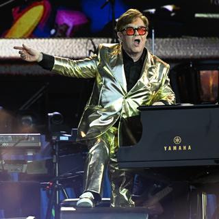 Le légendaire chanteur britannique Elton John en concert à Glastonbury le 25 juin 2023. [AFP - Oli SCARFF]