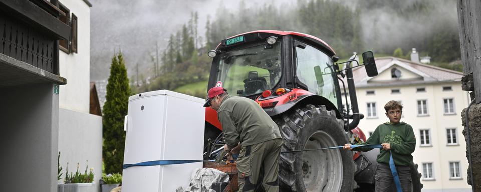 A Brienz, les habitants doivent évacuer leur village d'ici vendredi. [Keystone - Gian Ehrenzeller]