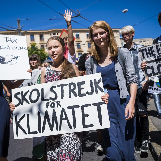 Greta Thunberg, fraîchement diplômée, cesse sa grève scolaire pour le climat. [Keystone - Jean-Christophe Bott]