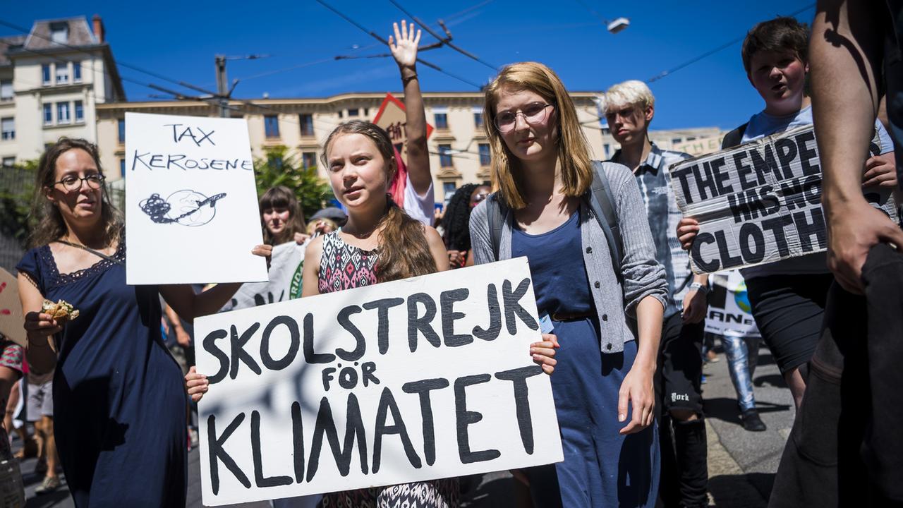 Greta Thunberg, fraîchement diplômée, cesse sa grève scolaire pour le climat. [Keystone - Jean-Christophe Bott]