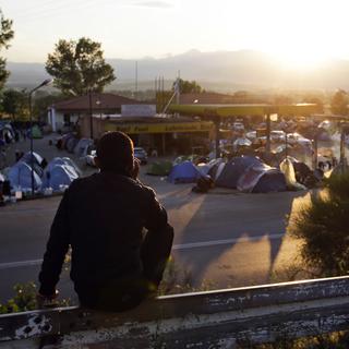 Un Syrien dans un camp de réfugié en Grèce. [AP Photo - Gregorio Borgia]