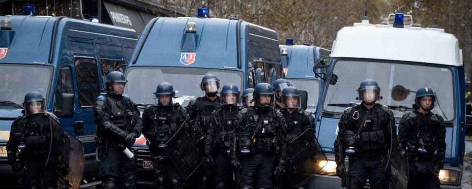 Quelque 45'000 policiers et gendarmes, des unités d'élite et des blindés ont été mobilisés en prévision des festivités du 14 juillet. [NurPhoto via AFP - Michael Candelori]