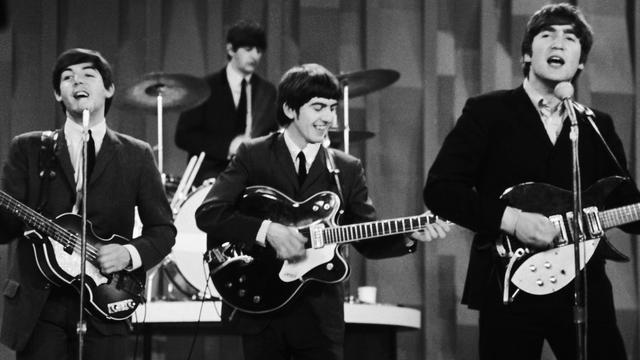 Les Beatles ici en 1964. [Keystone / AP Photo - Dan Grossi]