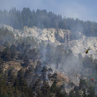Plus de 100 hectares de forêts ont brûlé dans l'incendie de Bitsch (VS) (Image d'illustration). [Jean-Christophe Bott - Keystone]