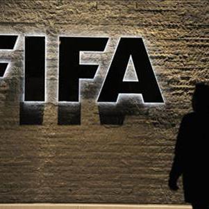 Genève, Lausanne et le canton de Neuchâtel ont emprunté des millions à la FIFA. [Keystone]