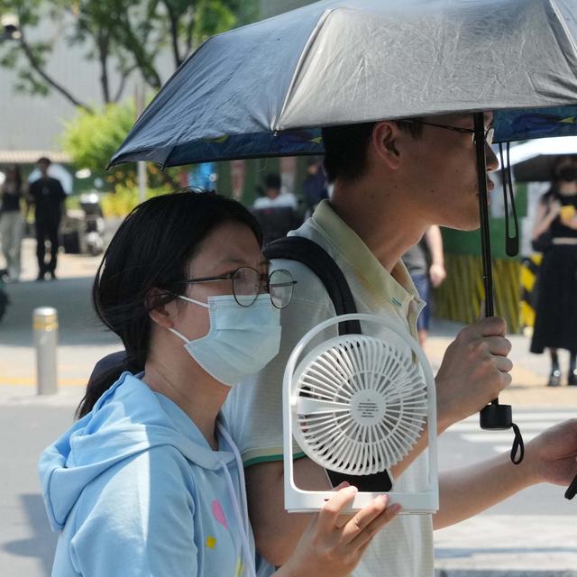 La chaleur écrase une partie de la Chine, Pékin en alerte rouge. [AFP - Ichiro Ohara / Yomiuri]