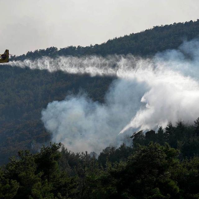 La Grèce entre dans son 7e jour de lutte contre les incendies, une amélioration près d'Athènes. [Keystone]