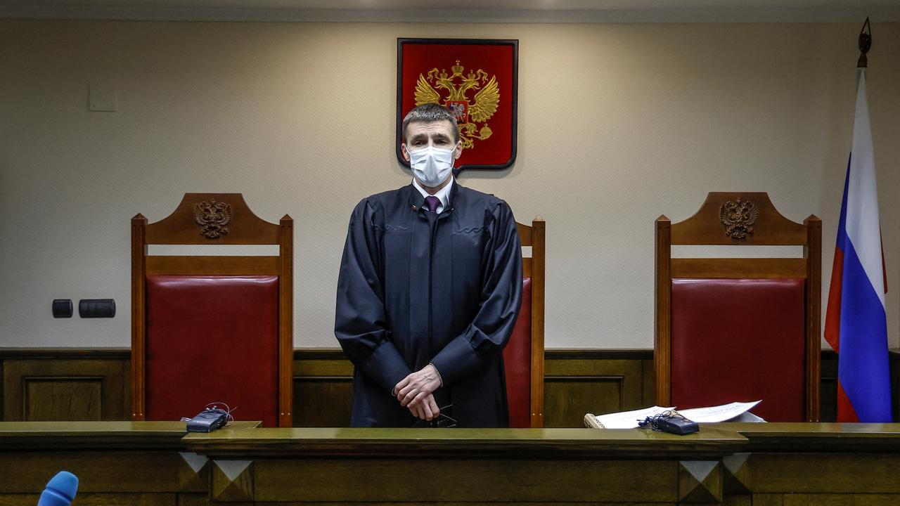 Oleg Nefedov, a judge of Russia’s Supreme Court, reads out the verdict during a hearing to consider a request by the Ministry of Justice to recognize the LGBTQ movement as extremist in Moscow, Russia, November 30, 2023. REUTERS/Maxim Shemetov [reuters - Maxim Shemetov]
