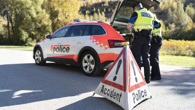 En 2022, l'Office fédéral des routes (OFROU) a dénombré 18'396 accidents de la route avec dommages corporels. [Keystone - Gaëtan Bally]