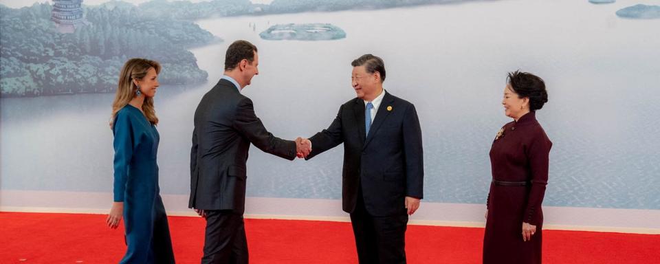 Le président chinois Xi Jinping accueille son homologue syrien Bachar al-Assad lors d'un banque de bienvenue, avant la cérémonie d'ouverture des Jeuy asiatiques, dans la ville chinoise de Hangzhou, le 23 septembre 2023. [Présidence syrienne - reuters]