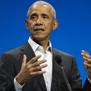 L'ancien président américain Barack Obama est attendu samedi soir au Hallenstadion à Zurich. [Keystone - AP Photo/John Minchillo]
