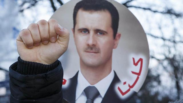 Bachar al-Assad est visé par un mandat d'arrêt émis par la justice française. [Keystone]