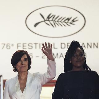 La réalisatrice Catherine Corsini, l'actrice Aïssatou Diallo Sagna et la productrice Elisabeth Perez lors de la projection de "Le retour" au 76e festival de Cannes le 17 mai 2023. [AFP - Valery HACHE]
