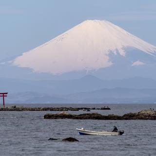 Le Mont Fuji est un emblème naturel du Japon. [Keystone - AP Photo/Kiichiro Sato]