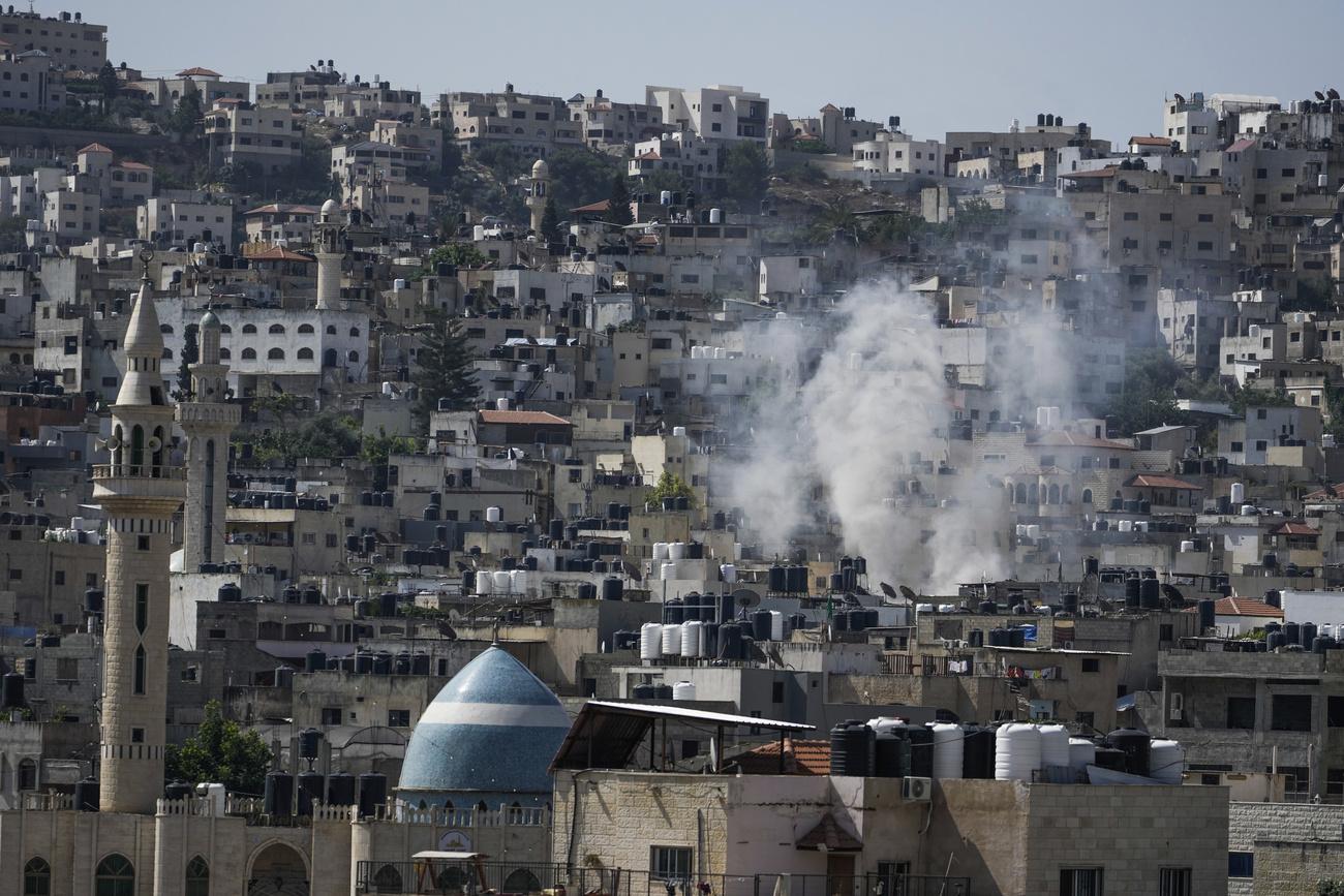 Opération de l'armée israélienne à Jénine, cinq Palestiniens tués. [Keystone - AP Photo/Majdi Mohammed]