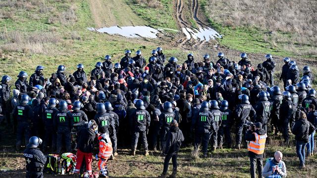 Une manifestation près de Lützerath en Allemagne. [Keystone - DPA/Federico Gambarini]