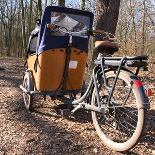 Un vélo cargo avec batterie à Berlin. [Depositphotos - Jobakashii]