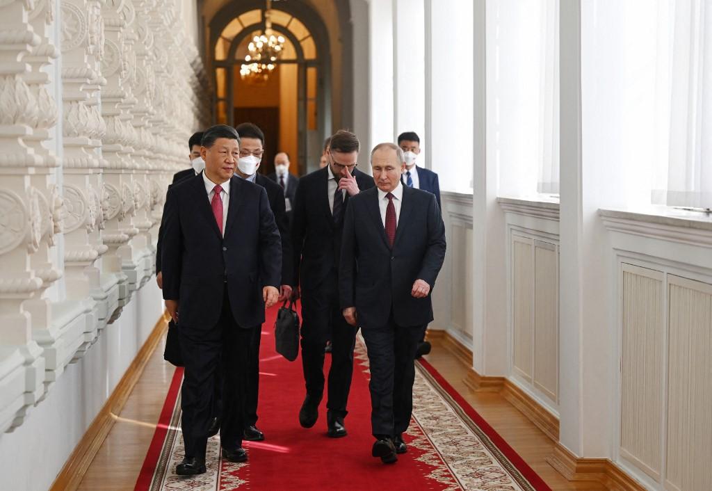 Le président russe Vladimir Poutine rencontre le président chinois Xi Jinping au Kremlin, à Moscou, mardi 21 mars 2023. [AFP - Grigory Sysoyev / Sputnik]