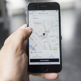 Le TF confirme que les chauffeurs Uber exercent une activité lucrative dépendante. [KEYSTONE - CHRISTIAN BEUTLER]