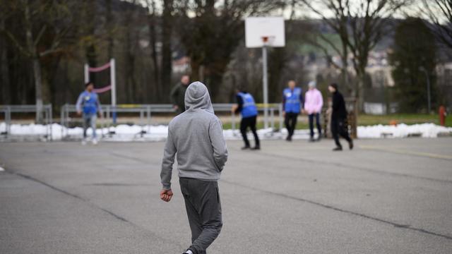 Un réfugié dans un centre du Secrétariat d'Etat aux migrations. [Keystone - Laurent Gillieron]