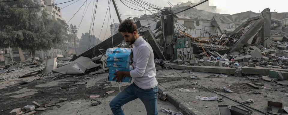 Témoignages des civils sur la bande de Gaza. [Keystone - EPA/Mohammed Saber]