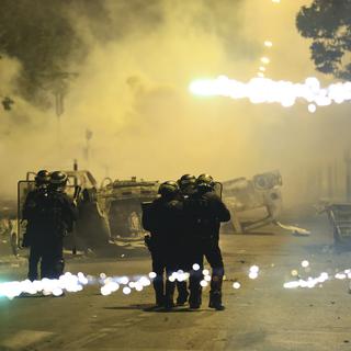Le gouvernement français redoute l’extension des émeutes alors que le pays est à vif. [AP/Keystone - Aurelien Morissard]