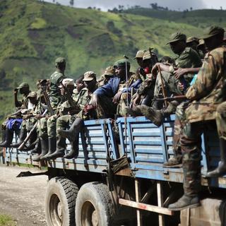 Des combattants en RDC. [KEYSTONE - AP Photo/Jerome Delay]
