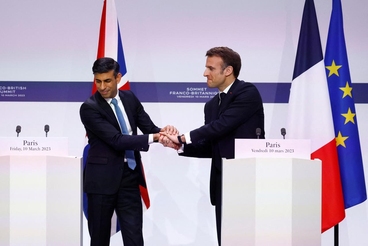 Le Premier ministre britannique Rishi Sunak et le président français Emmanuel Macron. [Keystone - Gonzalo Fuentes / EPA]