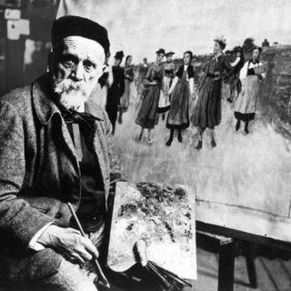 Le peintre suisse Albert Anker (1831-1910) dans son studio de Ins dans le canton de Berne, 1900. [Keystone - DR/Str]