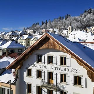 La Maison de la Tourbière va être officiellement ouverte vendredi aux Ponts-de-Martel (NE). [Keystone]