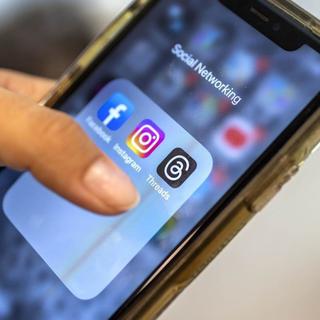 Le groupe Meta (Facebook, Instagram) a lancé jeudi dans l'UE son réseau social Threads. [Keystone]