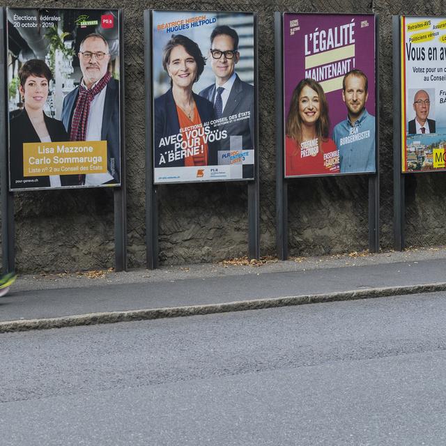 Des affiches électorales des différents partis politiques a Genève en vue des élections fédérales, le dimanche 6 octobre 2019. [Keystone - Martial Trezzini]