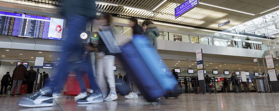 Une partie du personnel de l'aéroport de Genève menace de faire grève dès jeudi. [Keystone - Salvatore Di Nolfi]