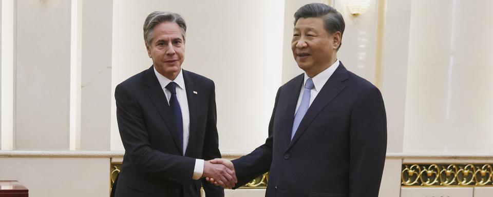 Le président chinois Xi Jinping a reçu le secrétaire d'Etat américain Antony Blinken à Pékin lundi. [Keystone - Leah Millis/Pool Photo via AP]