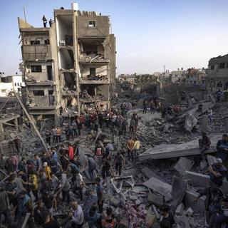 Les frappes israéliennes sur Gaza ont tué 9770 personnes, dont 4800 enfants, a annoncé le Hamas. [Keystone]