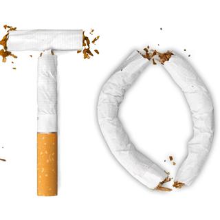 Des cigarettes forment le mot "Stop". [Depositphotos - Billiondigital]